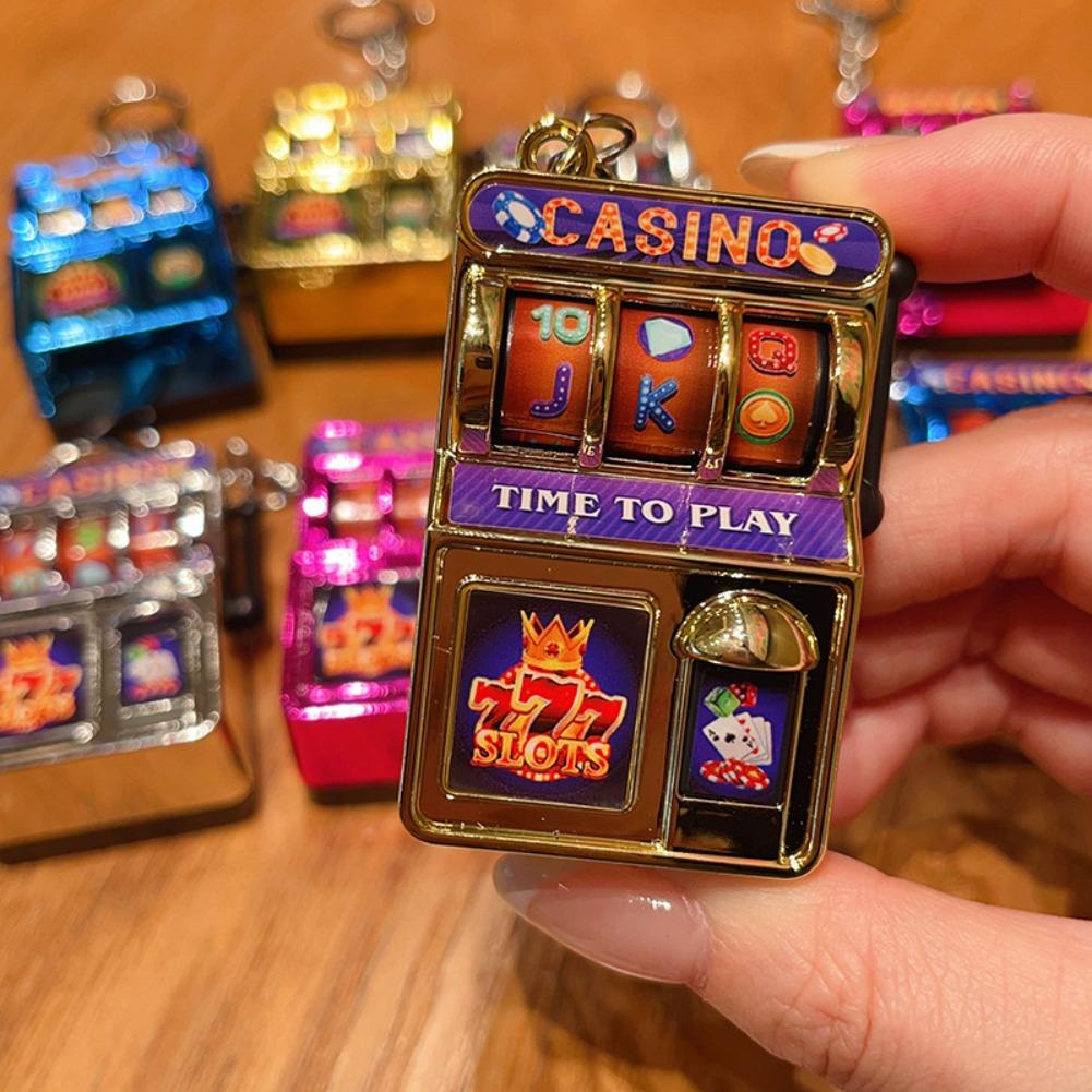 ミニギャンブルスロットマシンキーチェーン、クリエイティブなア - Arcade Game Jackpot のレビューと価格